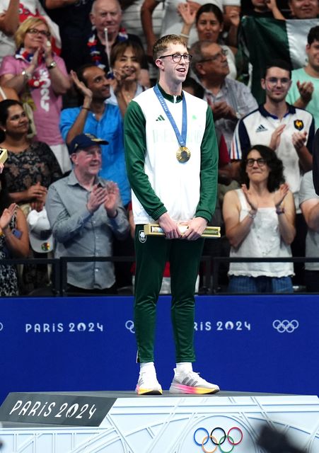 Ireland’s Daniel Wiffen stands for the national anthem after winning the men’s 800m freestyle final (John Walton/PA)