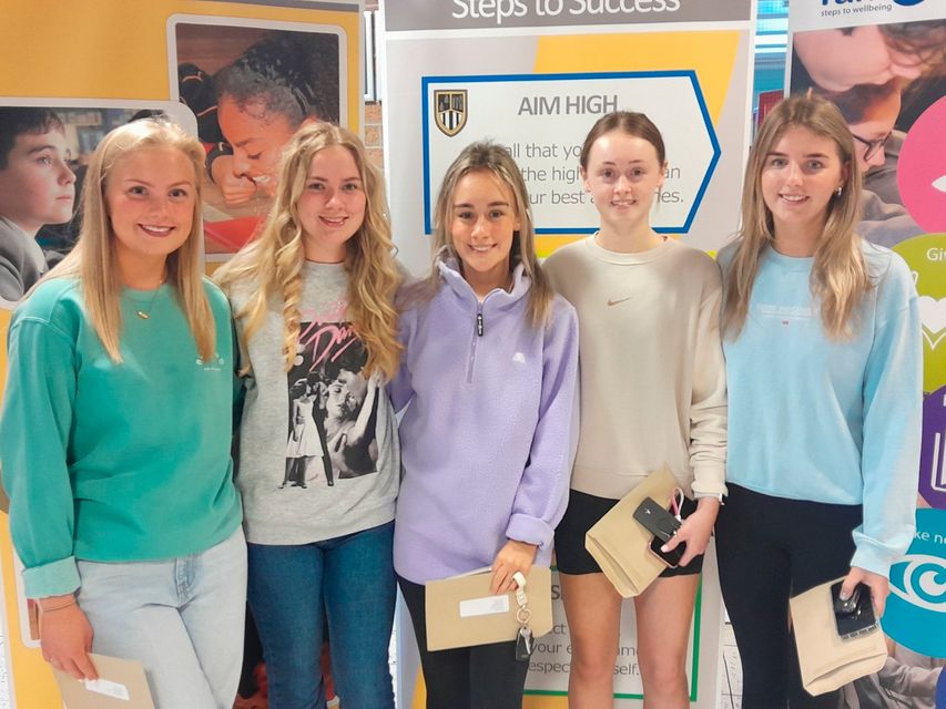 Anna Francey, Emma Houston, Leah Scott, Anna Service and Naomi Turtle were among those receiving their A Level results at Dunclug College in Ballymena.