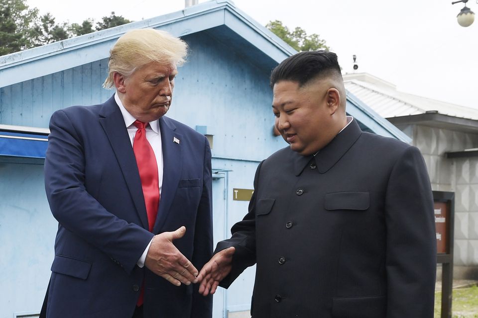 North Korean leader Kim Jong Un, right, and US President Donald Trump visit the Demilitarised Zone in 2019. (AP/Susan Walsh)