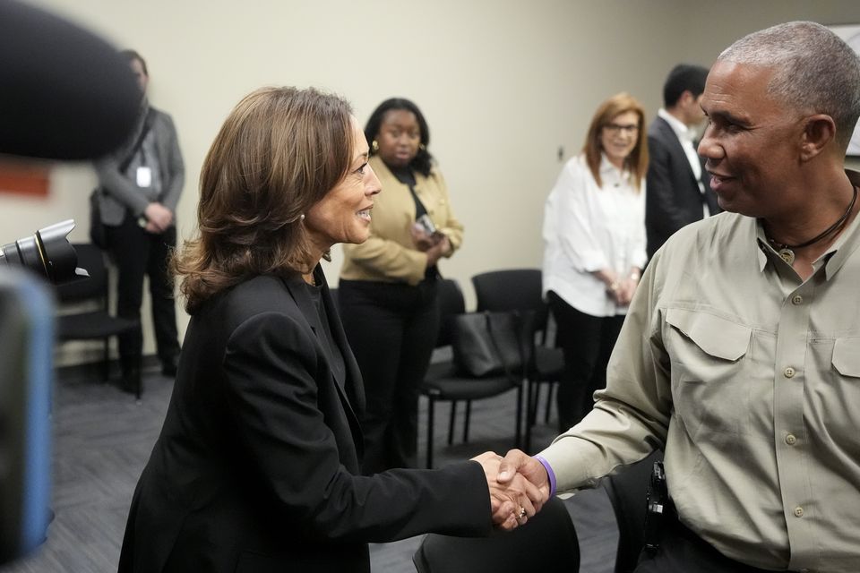 Kamala Harris greets local officials in North Carolina after receiving a briefing on the damage from Hurricane Helene (Chris Carlson/AP)