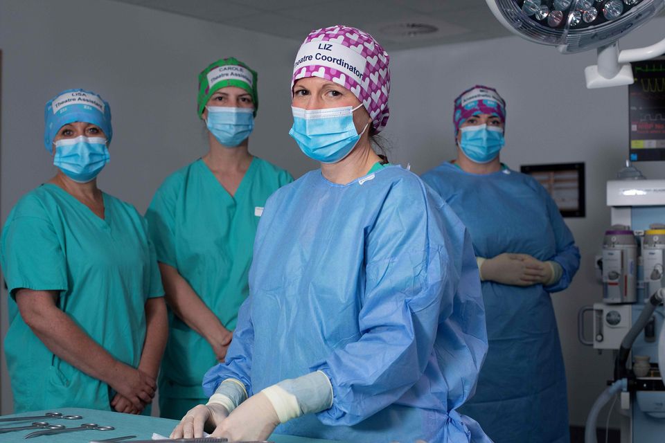 Medical staff can be more easily identified by patients and colleagues with the caps (Marsaili Mainz/PA)