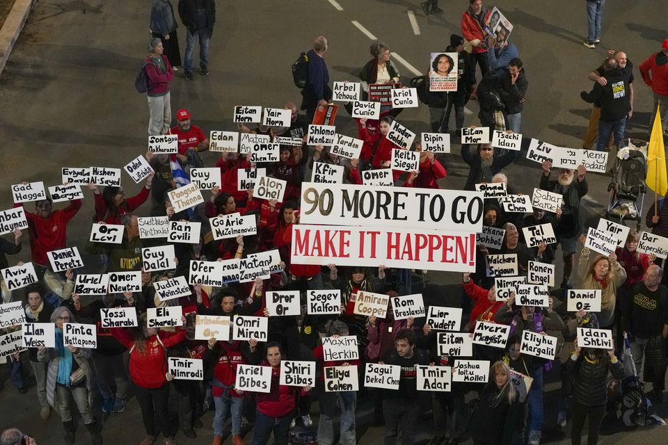 Demonstrators protest calling for the immediate release of the hostages held in the Gaza Strip  (AP/Ohad Zwigenberg)