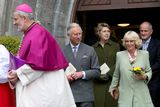 thumbnail: The Prince of Wales and the Duchess of Cornwall (centre) and Former President of Ireland Mary McAleese and her husband Martin (behind) after a peace and reconciliation prayer service at St. Columba's Church in Drumcliffe on day two of a four day visit to Ireland. PRESS ASSOCIATION Photo. Picture date: Wednesday May 20, 2015. See PA story ROYAL Ireland. Photo credit should read: Colm Mahady/PA Wire