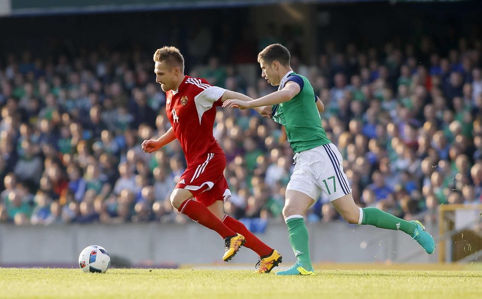 Picture - Kevin Scott / Presseye

Belfast , UK - May 27, Pictured is Northern Irelands Paddy McNair and Belarus' Siarhei Krivets in action during the last home game before heading to the Euros on May 27 2016 in Belfast , Northern Ireland ( Photo by Kevin Scott / Presseye)