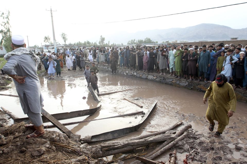 The storm caused landslides, destroying homes across the region (AP)