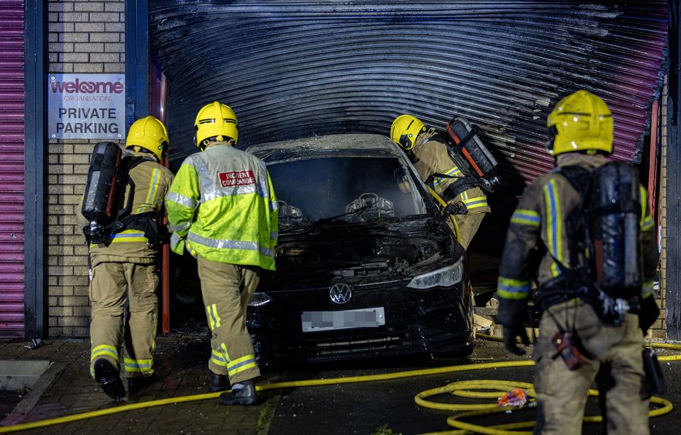 Firefighters at the scene of a ramming incident at the Welcome Centre on Townsend Street in west Belfast on July 23rd 2024 (Photo by Kevin Scott)