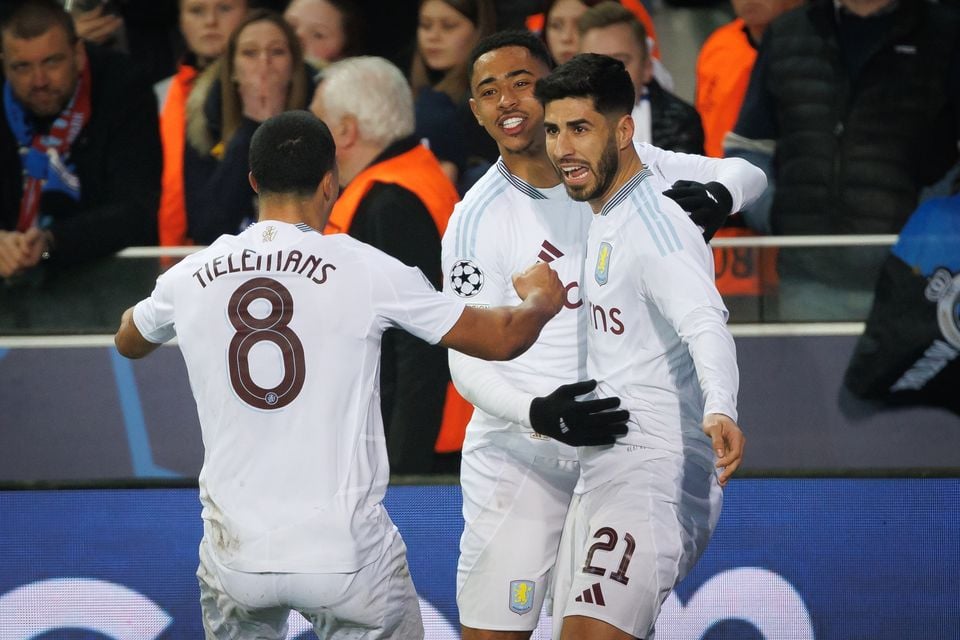 Marco Asensio celebrates scoring Villa’s third against Club Brugge (PA Wire via Belga)