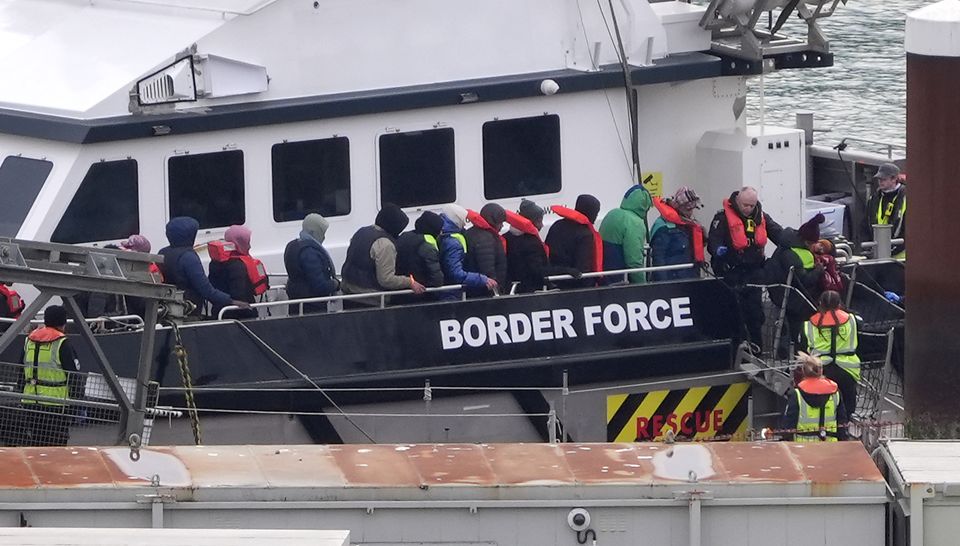 A group of people thought to be migrants are brought in to Dover, Kent, from a Border Force vessel following a small boat incident in the Channel (Gareth Fuller/PA)