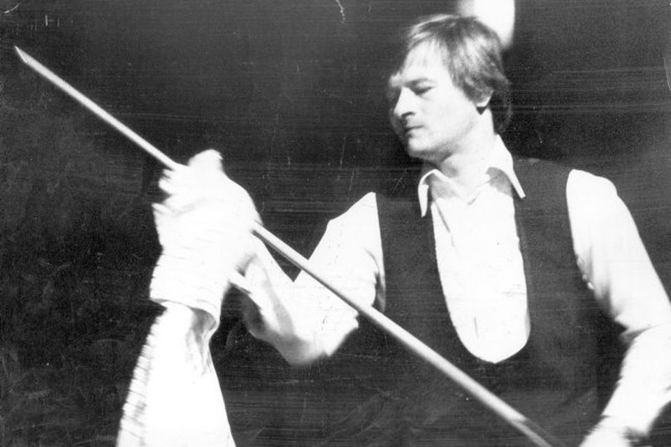 Alex Higgins.  Snooker Legend.  A familiar sights for snooker fans... Irish professional champion Alex Higgins wiping his cue with a towel during last night's title match against Dennis Taylor in the Ulster Hall.  Higgins won the first session 7-2 in the 41 frame decider which is being presented by the 'Belfast Telegraph' and Kearney Promotions.    (03/02/1978)