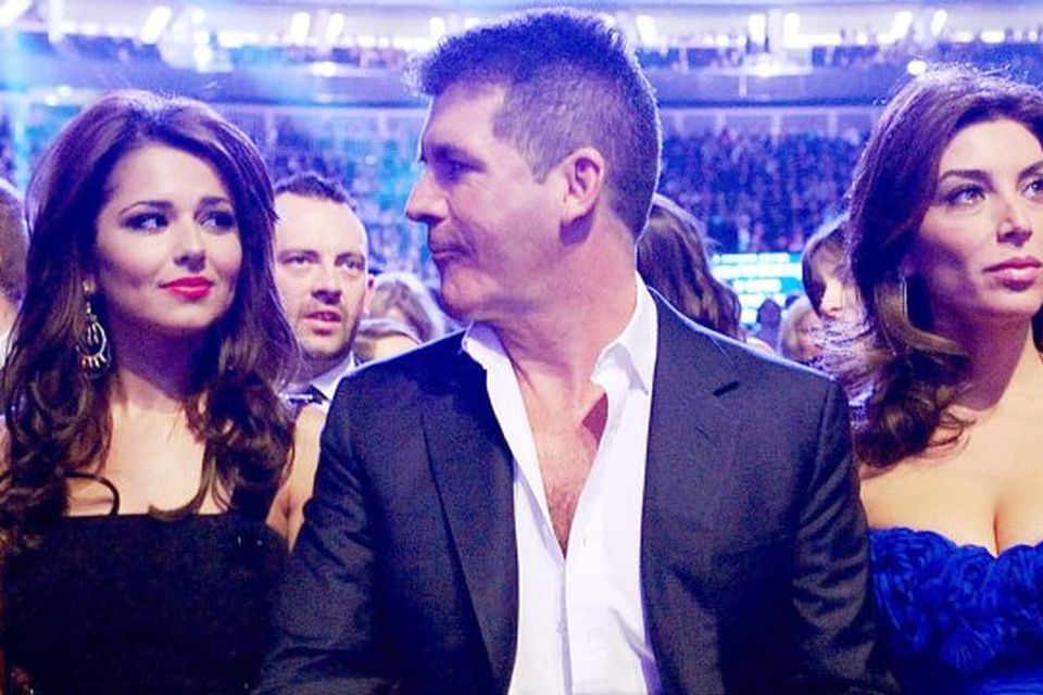 Cheryl Cole, Simon Cowell and Mezhgan Hussainy during the 2011 National Television Awards at the O2 Arena, London.