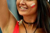 thumbnail: The beautiful game - football fans from around the world -   A Poland supporter gestures prior to the Euro 2016 quarter-final football match between Poland and Portugal at the Stade Velodrome in Marseille on June 30, 2016.