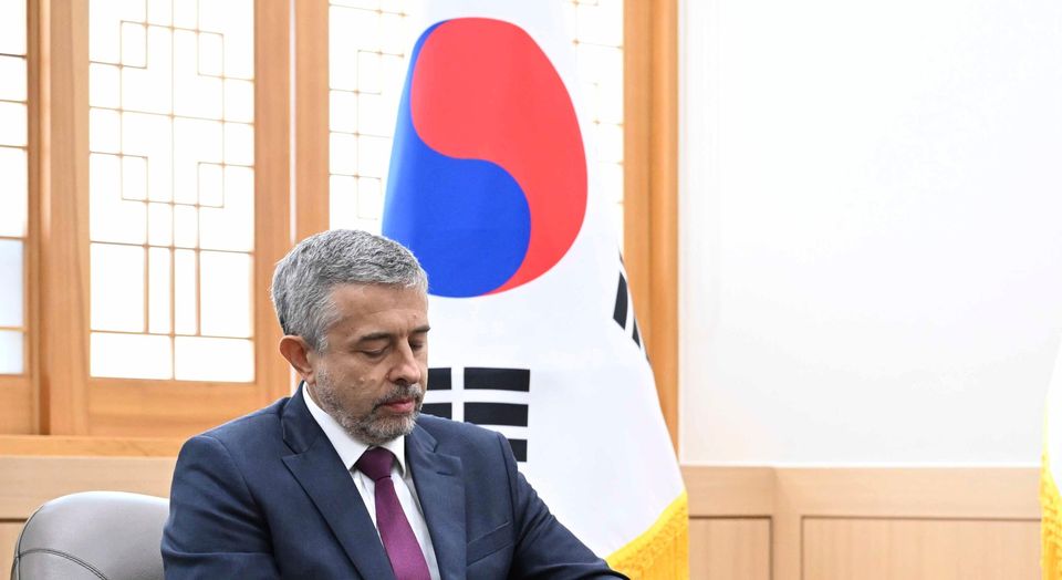 South Korea’s vice foreign minister Kim Hong Kyun, right, meets with Russian ambassador to South Korea Georgy Zinoviev at the Foreign Ministry in Seoul, South Korea (South Korea Foreign Ministry/AP)