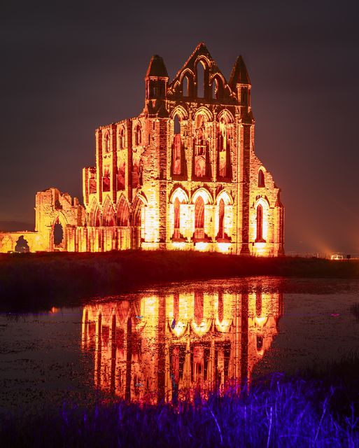 Lights illuminate the ruins of Whitby Abbey in North Yorkshire to mark Halloween (Danny Lawson/PA)