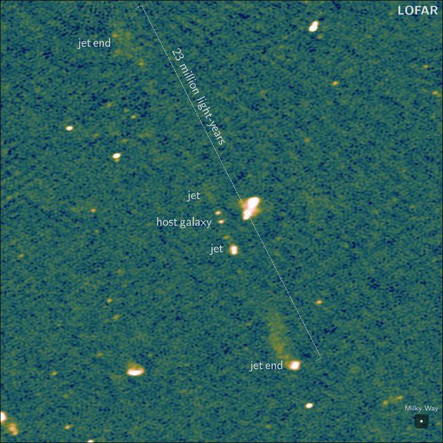 The Porphyrion jet system was discovered around 7.5 billion light years from Earth (LOFAR Collaboration/WISE/NASA/JPL-Caltech/Martijn Oei/PA)