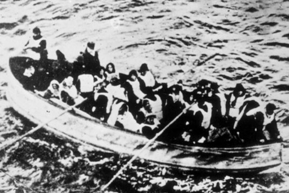 Survivors of the Titanic disaster in a crowded lifeboat.
