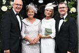 thumbnail: From L-R Danny and Karen Kennedy and Eleanor and Jeffrey Donaldson’s as Happy Couple Philip and Laura got married at Dromore Presbyterian Church on Thursday. Pic Colm Lenaghan/Pacemaker