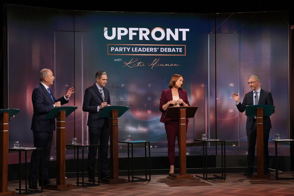 (left to right) Tanaiste Micheal Martin, Taoiseach Simon Harris, RTE presenter Katie Hannon and Green Party leader Roderic O’Gorman during the General Election leaders’ debate (Niall Carson/PA)