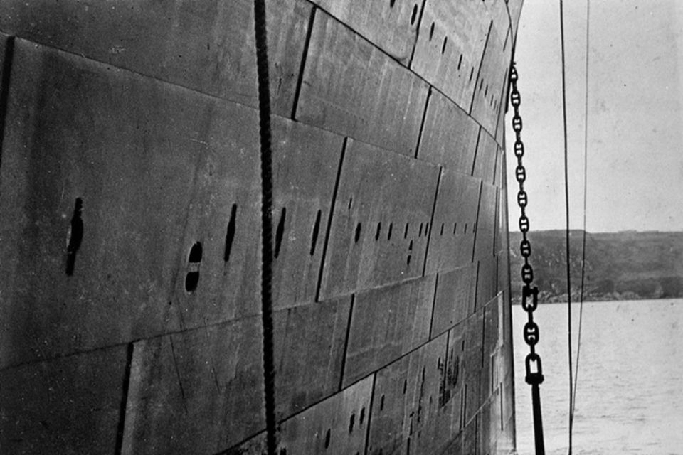 Giant starboard anchor of the Titanic is raised for the last time. 1.55pm 11th April 1912 in a picture taken by Father Browne.