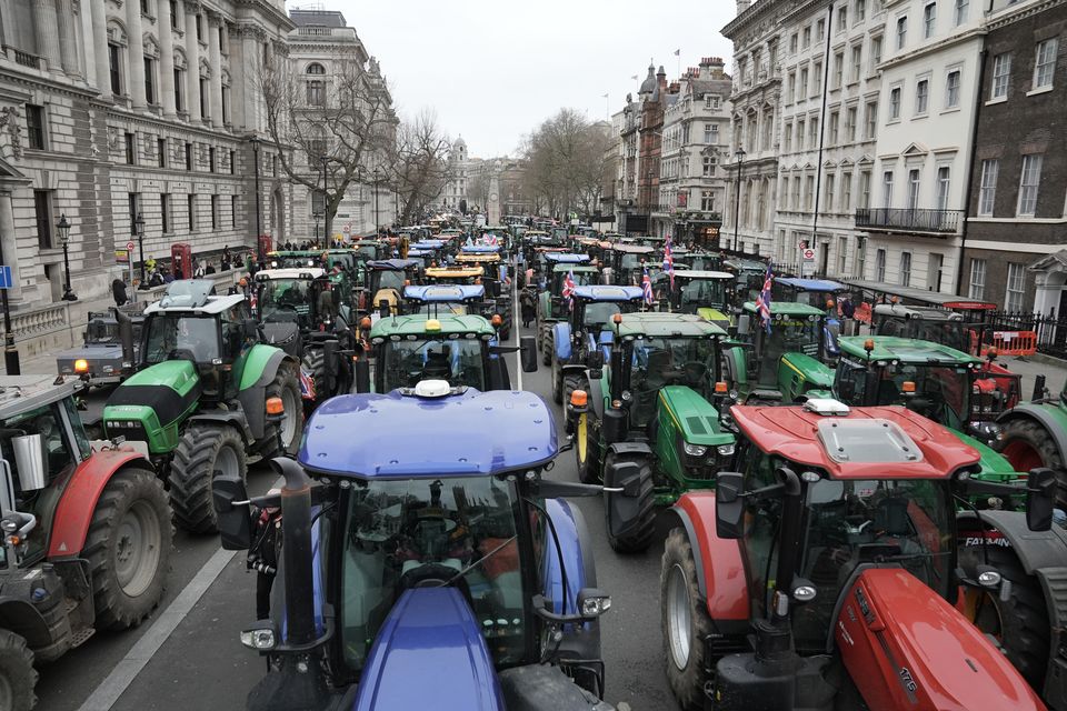 Dozens of tractors parked on Whitehall during the protest (Stefan Rousseau/PA)