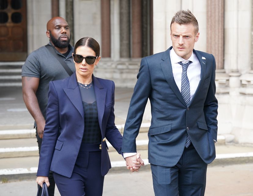 Rebekah and Jamie Vardy leave the Royal Courts Of Justice (Yui Mok/PA)