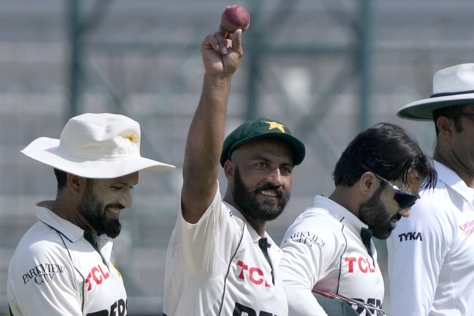 Sajid Khan, centre, took seven wickets for Pakistan (K.M. Chaudary/AP)