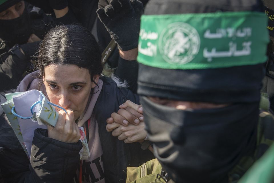 Israeli captive Arbel Yehoud is escorted by Hamas and Islamic Jihad fighters (Jehad Alshrafi/AP)