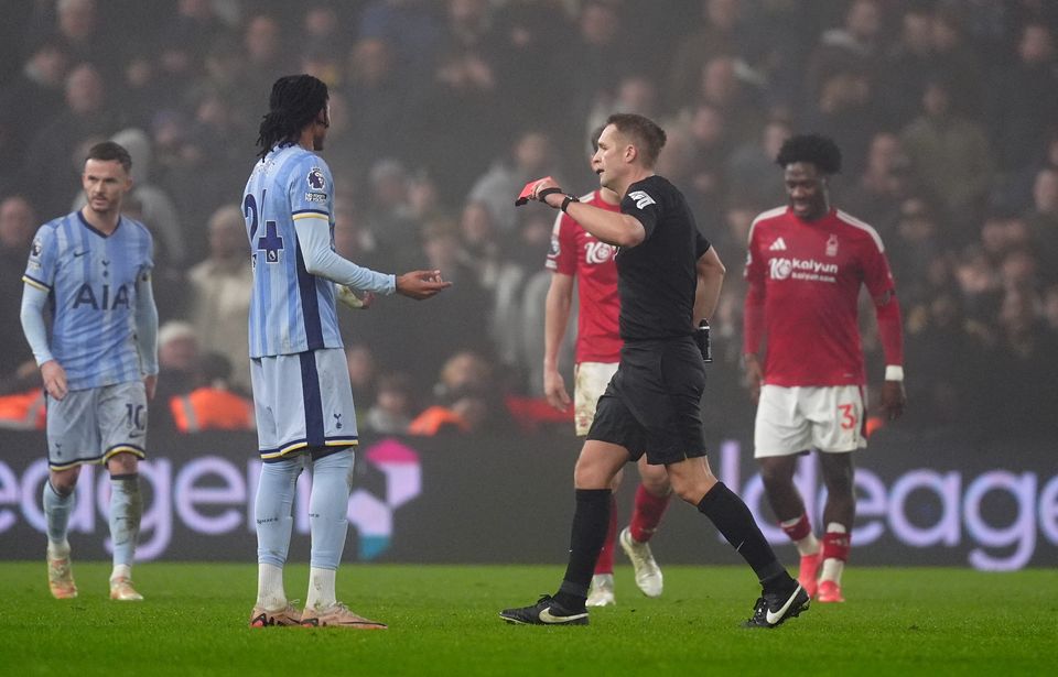 Tottenham had Djed Spence sent off at the death (Mike Egerton/PA).