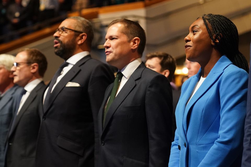 Tory leadership candidates, Tom Tugendhat, James Cleverly, Robert Jenrick and Kemi Badenoch at the party’s conference in Birmingham (Jacob King/PA)