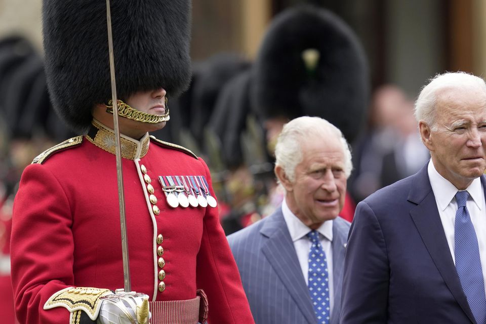 Joe Biden with the King on a visit to the UK (Kin Cheung/PA)