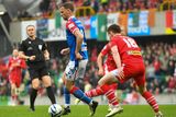 thumbnail: Cliftonville defender Paddy Burns closes down Linfield striker Matthew Fitzpatrick during the Irish Cup Final