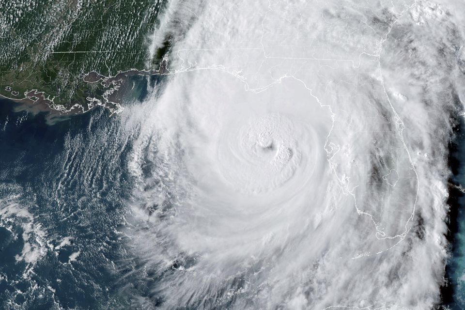 The storm made landfall as a Category 4 hurricane and left many communities flooded and without power (NOAA via AP)