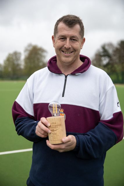 Greg Thompson receives the Game Changers Award on behalf of Royal School Armagh
