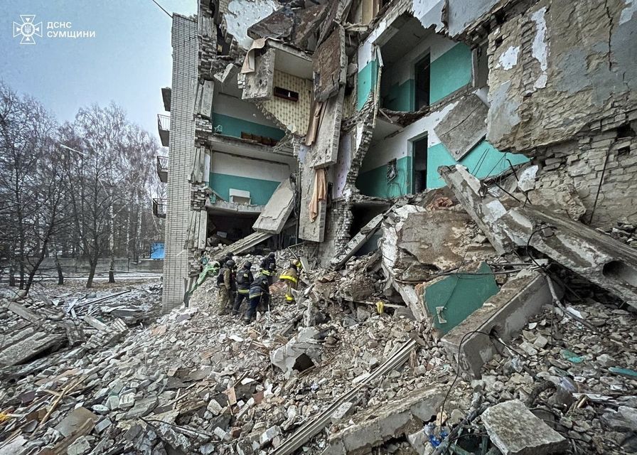 Rescue workers clear the rubble of a residential building destroyed by a Russian strike in Hlukhiv, Ukraine (Ukrainian Emergency Service/AP)