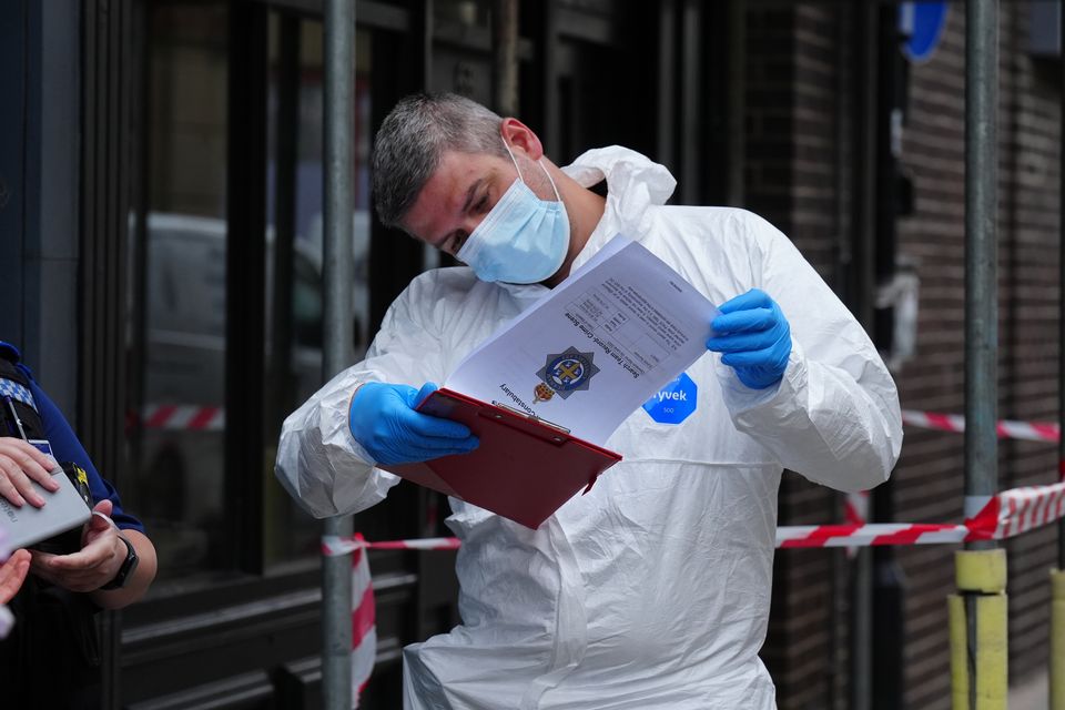 Police forensic investigators enter a disused building in Fore Bondgate (Owen Humphreys/PA)