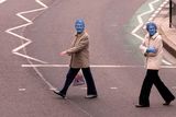 thumbnail: After taking part in Spencer Tunick's "Sea of Hull" installation, two women cross the road in Kingston upon Hull on July 9, 2016. AFP/Getty Images