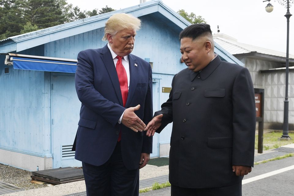 FILE – In this June 30, 2019 file photo, President Donald Trump meets with North Korean leader Kim Jong Un (Susan Walsh/AP, File)