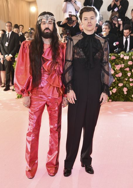 Harry Styles embraces camp in see through Gucci top at Met Gala