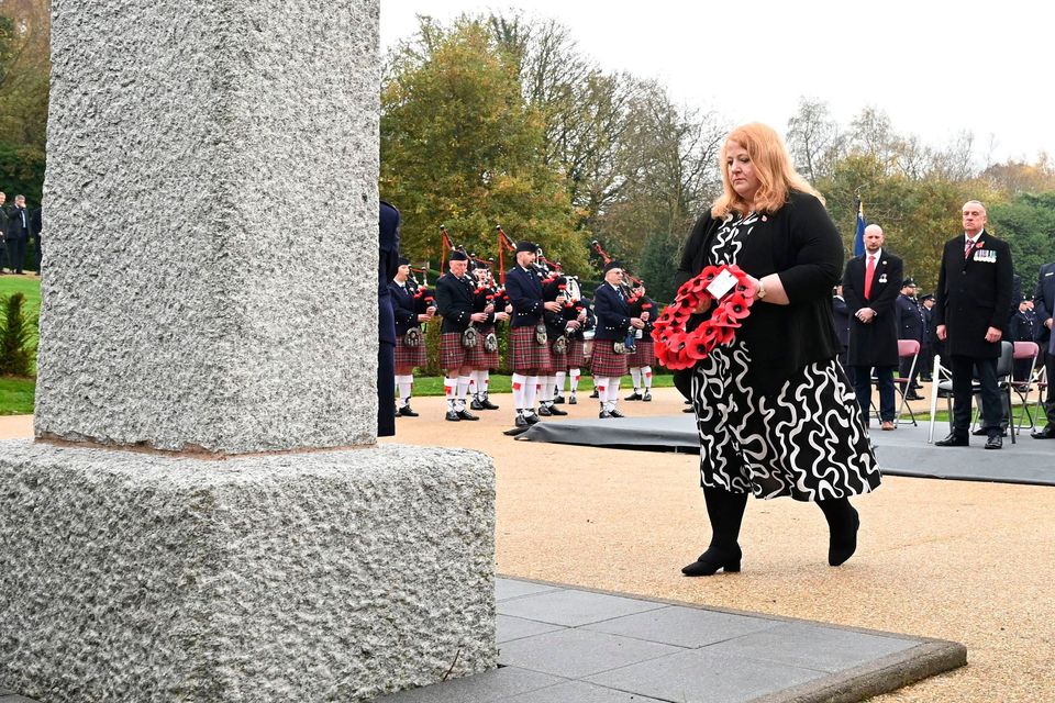 Naomi Long paying her respects at the memorial service