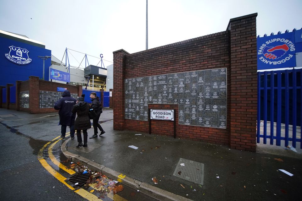 Liverpool’s trip to Goodison Park was postponed on safety grounds, due to strong winds and rain (Peter Byrne/PA)