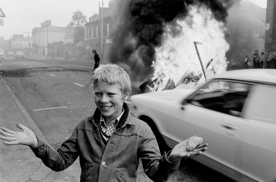 Youth with a stone during a riot at the top of Leeson Street, west Belfast, 1978. Photo credit: Chris Steele-Perkins/Magnum Photos