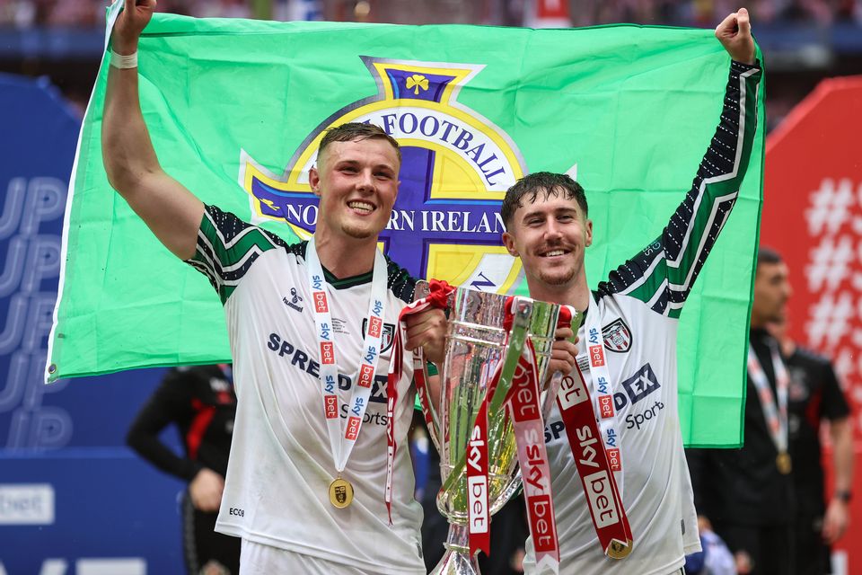 Northern Ireland's Daniel Ballard and Trai Hume toast Sunderland’s promotion to the Premier League