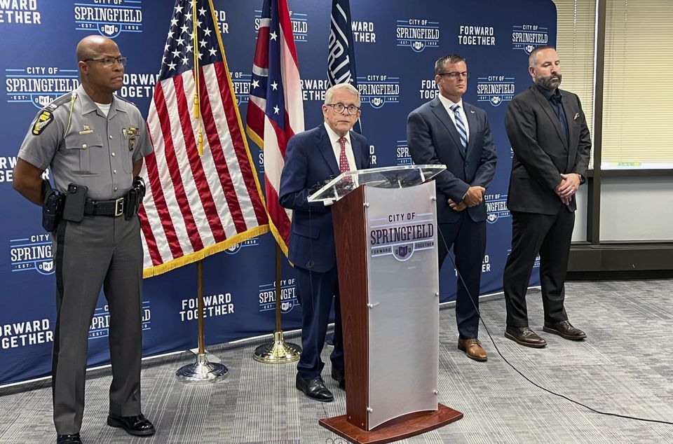 Governor Mike DeWine holding a news conference on Monday at city hall in Springfield, Ohio (Patrick Aftoora Orsagos/AP)