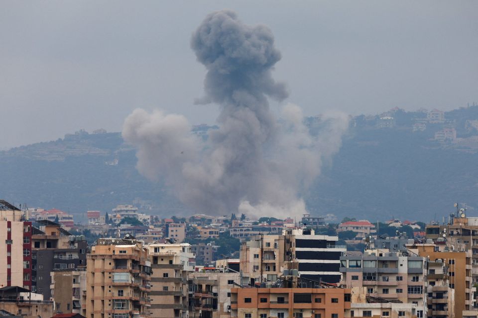 Smoke billows from a building in Tyre, southern Lebanon, where the war has spread to. Photo: Reuters