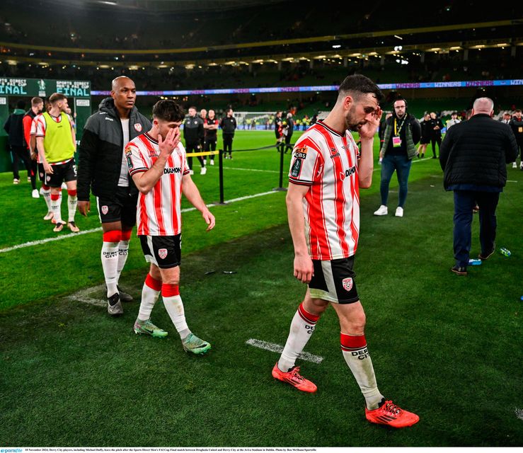 Derry City players leave the pitch after the FAI Cup final defeat to Drogheda United