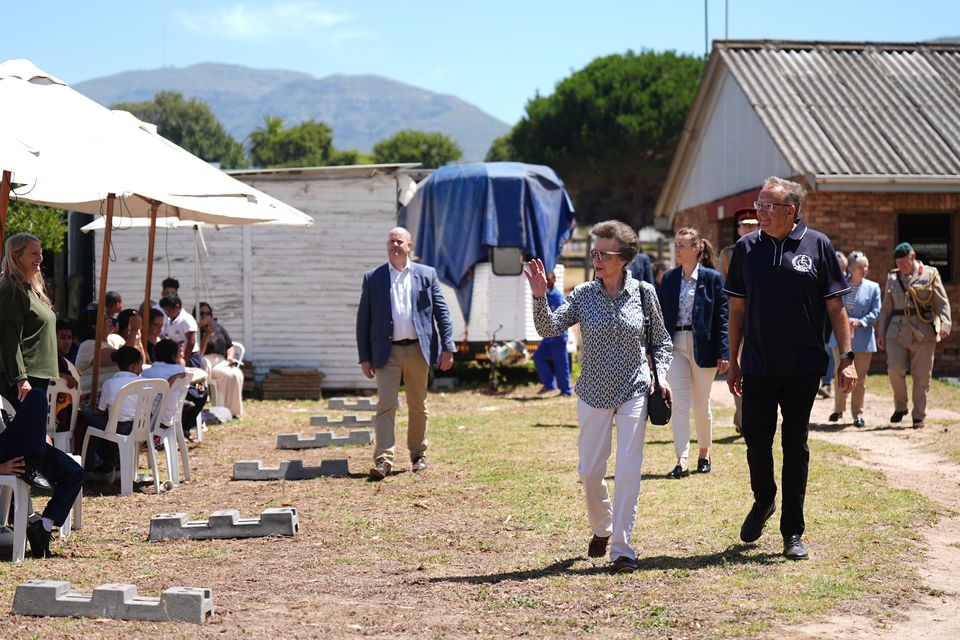 The Princess Royal waves during a visit to the South African Riding School for Disabled Association (Aaron Chown/PA)