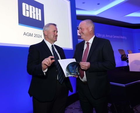 Then CRH chief executive Albert Manifold at the company AGM in April last year (left) with his successor, then chief financial officer Jim Mintern