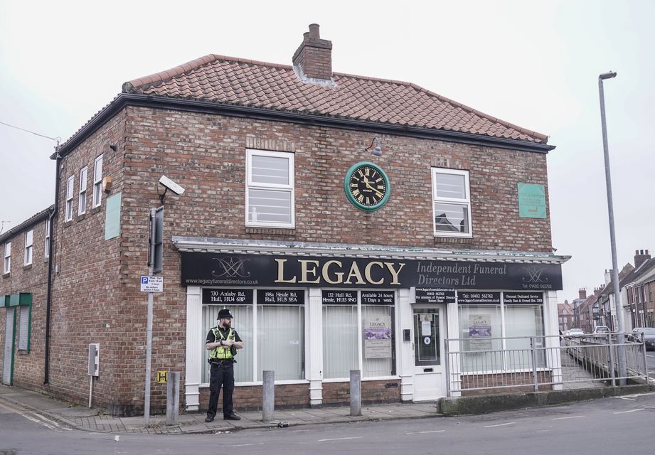 Police outside the Beckside branch of Legacy Independent Funeral Directors in Hull (Danny Lawson/PA)