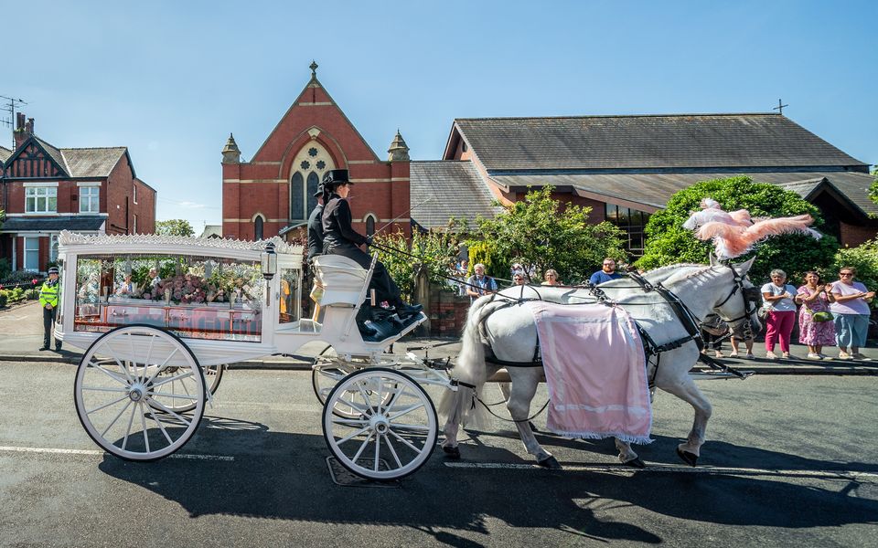 The horse-drawn carriage carrying the coffin of Southport stabbing victim Alice da Silva Aguiar (Danny Lawson/PA)