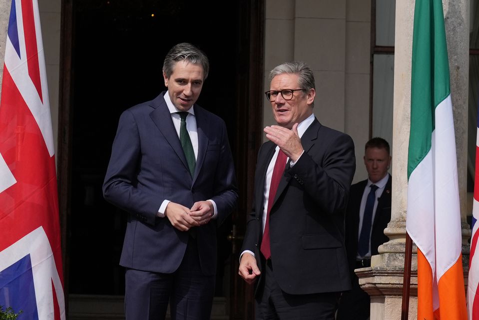 Taoiseach Simon Harris greets Prime Minister Sir Keir Starmer outside Farmleigh House (Brian Lawless/PA)