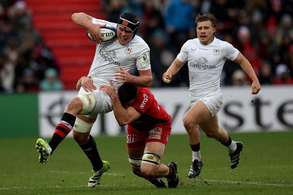 Ulster's Irish number eight James McNabney is tackled